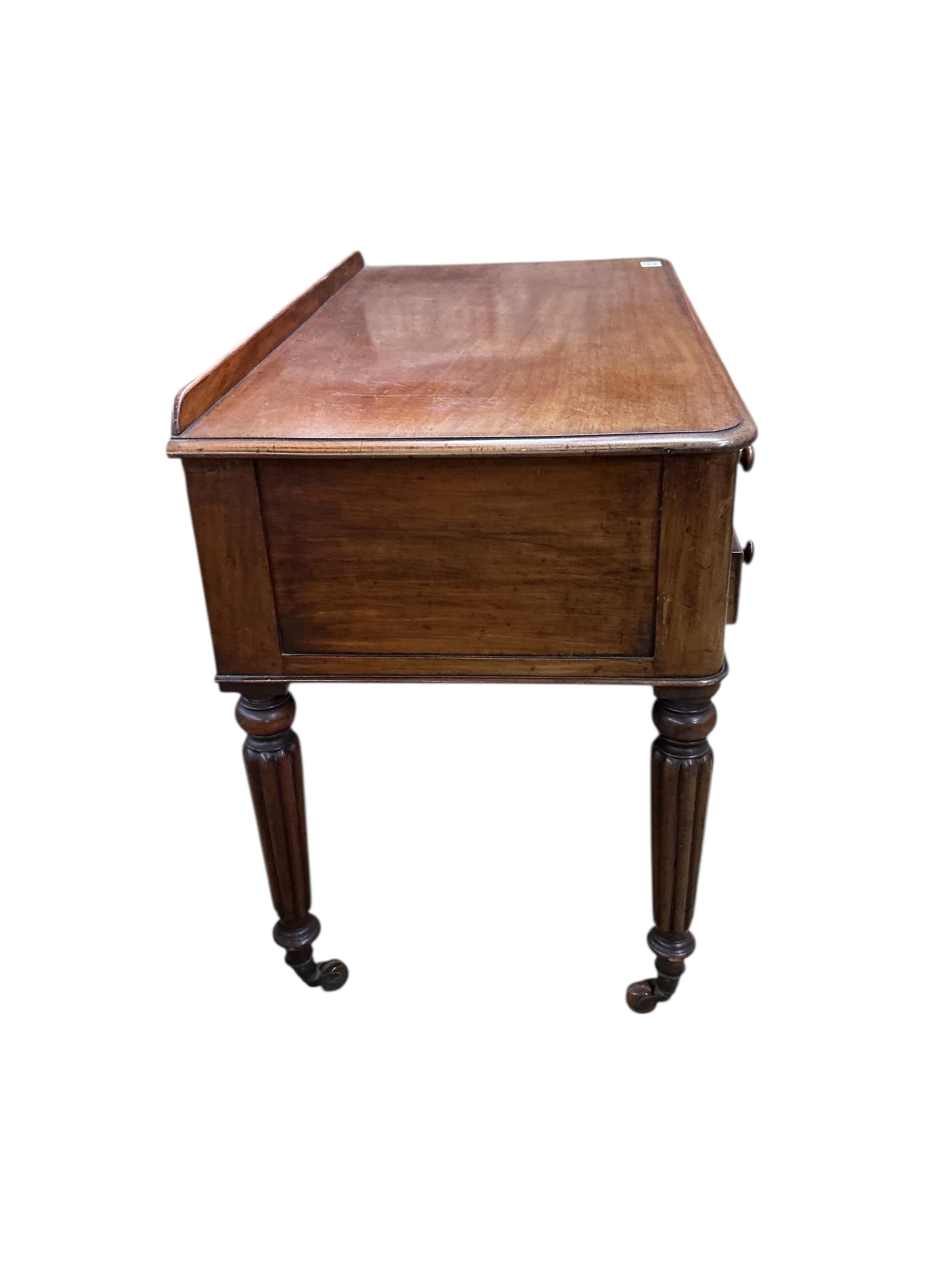 A Victorian mahogany kneehole dressing table, width 104cm, depth 54cm, height 79cm